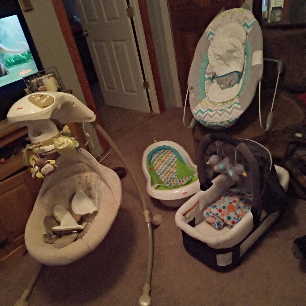 Swing, bassinet, bathtub, and a bouncer